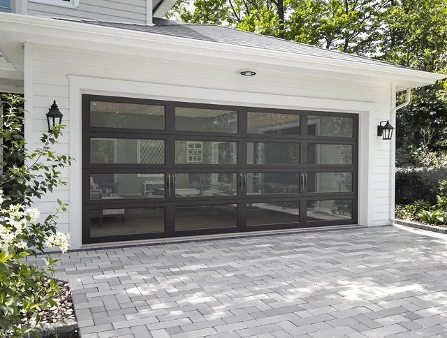 Indian Trail Garage Door Repair design specialist presenting custom garage door options to Indian Trail homeowner