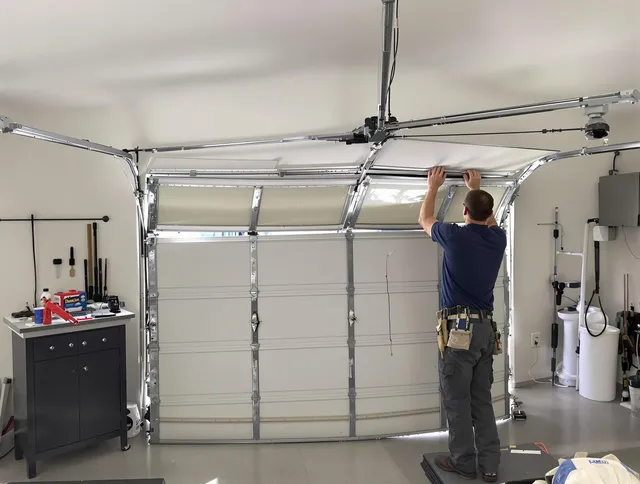 Indian Trail Garage Door Repair specialist performing precise section replacement on Indian Trail garage door