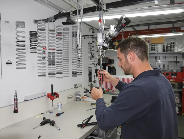Indian Trail Garage Door Repair safety certified technician performing precision spring replacement in Indian Trail