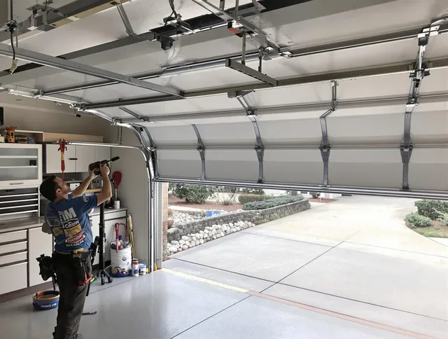 Garage door track repair service by Indian Trail Garage Door Repair in Indian Trail